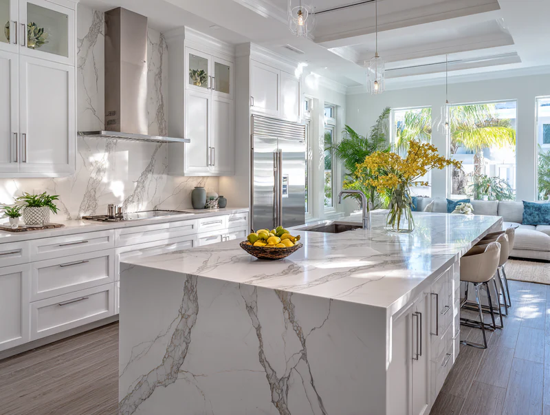 Coastal kitchen with Calacatta quartz and tropical plants
